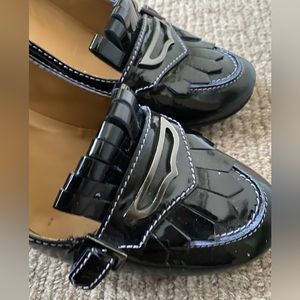 Tod’s patent leather pumps